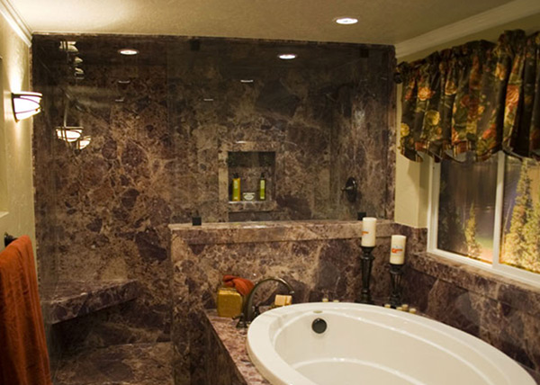 new bathtub surrounded by granite