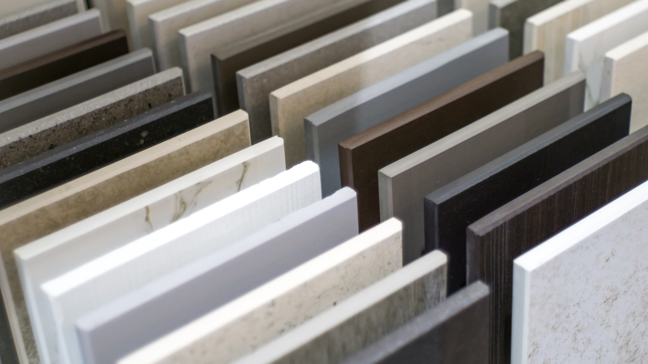 Choosing the Right Kitchen Countertop Material for Your Renovation By W. Hemsath Countertops can drastically change the look of your kitchen, but when planning a kitchen remodel, appearance is only one consideration. The kitchen countertop material you choose will also affect the cost of your kitchen remodel, as well as the durability of your counters and the maintenance they will require. To help you make the right choice during your kitchen renovation, here's an updated look at the top trending countertop materials for 2024, including how much they’ll cost you in money and upkeep, how durable they are, and what other homeowners enjoy most about each one. To make it simple to compare materials, we’ve scored their maintenance and durability in a range of 0-10: 0 being the lowest on maintenance and lowest in durability. 10 is the highest maintenance requirement and the highest in durability. 1. Quartz Cost: $70–$150 per square foot (installed) Low Maintenance: (3/10); no sealing required, though sealing is recommended for easier cleaning and improved resistance to staining; clean with mild soap and water. High Durability: (7/10); non-porous and resistant to scratching and staining, though things like wine can stain if not sealed; heat resistant but only up to 300° F, so trivets are recommended for all hot pans. What Homeowners Like Most: Homeowners love quartz for its uniform appearance and wide range of colors and patterns. Its affordability, durability, and low maintenance make it especially attractive for busy households. 2. Granite Cost: $50–$200 per square foot (installed) Moderate Maintenance: (6/10); requires sealing once a year; clean with mild soap or stone cleaner. High Durability: (9/10); resistant to heat and scratching but may be prone to chipping if heavy objects are dropped. What Homeowners Like Most: Granite’s natural beauty and unique patterns are major selling points. Many homeowners appreciate the high-end look and feel, as well as its resilience under heavy use. All natural beauty that comes from the earth. 3. Marble Cost: $75–$250 per square foot (installed) High Maintenance: (8/10); requires sealing every 3-6 months to prevent staining and etching; clean gently with a pH-neutral cleaner. Moderate Durability: (5/10); prone to scratching, staining, and etching from acids (like lemon juice); heat resistant up to 350° F for short periods of time. What Homeowners Like Most: Marble is beloved for its timeless elegance and luxurious veining. Homeowners who want a high-end, sophisticated look often choose marble despite its higher maintenance needs. 4. Butcher Block Cost: $40–$100 per square foot (installed) Moderate Maintenance: (5/10); requires oiling every 1-3 months to prevent drying, cracking, and water damage; clean with mild soap and water. Moderate Durability: (6/10); prone to scratches and dents but can be sanded down; not heat resistant and subject to burn marks if trivets aren’t used. What Homeowners Like Most: Homeowners love the warmth and natural look and the added functionality that butcher block adds to a kitchen. It’s also one of the more affordable options, making it attractive for budget-conscious renovations. 5. Concrete Cost: $70–$150 per square foot (installed) Moderate Maintenance: (7/10); requires sealing every 1-3 years to prevent stains; clean with a pH-neutral, non-abrasive cleaner. Moderate Durability: (7/10); prone to hairline cracks if not properly reinforced; resistant to scratching, staining, and heat if properly sealed; can be sensitive to sudden temperature changes. What Homeowners Like Most: Homeowners love concrete for its modern, industrial aesthetic and the ability to customize it with embedded materials or unique shapes. 6. Recycled Materials (e.g., Glass Composite) Cost: $50–$125 per square foot (installed) Low Maintenance: (4/10); sealing may be required; clean with mild soap or regular household cleaners. High Durability: (7/10); resistant to scratches and stains; generally heat-resistant, but care should be taken with very hot items. What Homeowners Like Most: Eco-conscious homeowners appreciate the sustainable nature of recycled countertops. They also love the striking, often colorful appearance that can complement a modern kitchen design. Budgeting for Your Kitchen Countertop As you plan your kitchen remodel, remember that the cost of a kitchen remodel can vary significantly based on the countertop material you select. Additionally, choosing a material that aligns with your desired esthetic, maintenance leve,l and durability needs will help ensure long-term satisfaction. Whether you prefer the low-maintenance durability of quartz or the natural beauty of butcher block, there is a perfect countertop for every kitchen style and budget. For homeowners in Utah, it’s helpful to consult with local experts who understand the climate and can recommend materials that will hold up in dry, high-altitude conditions. Whatever your choice, your kitchen renovation can be a stunning success with the right countertop!