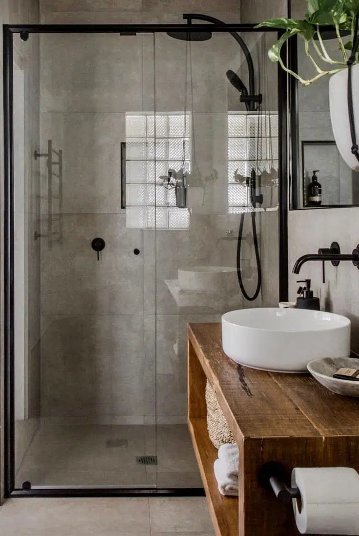 Modern bathroom with slab tiles and distressed wood vanity